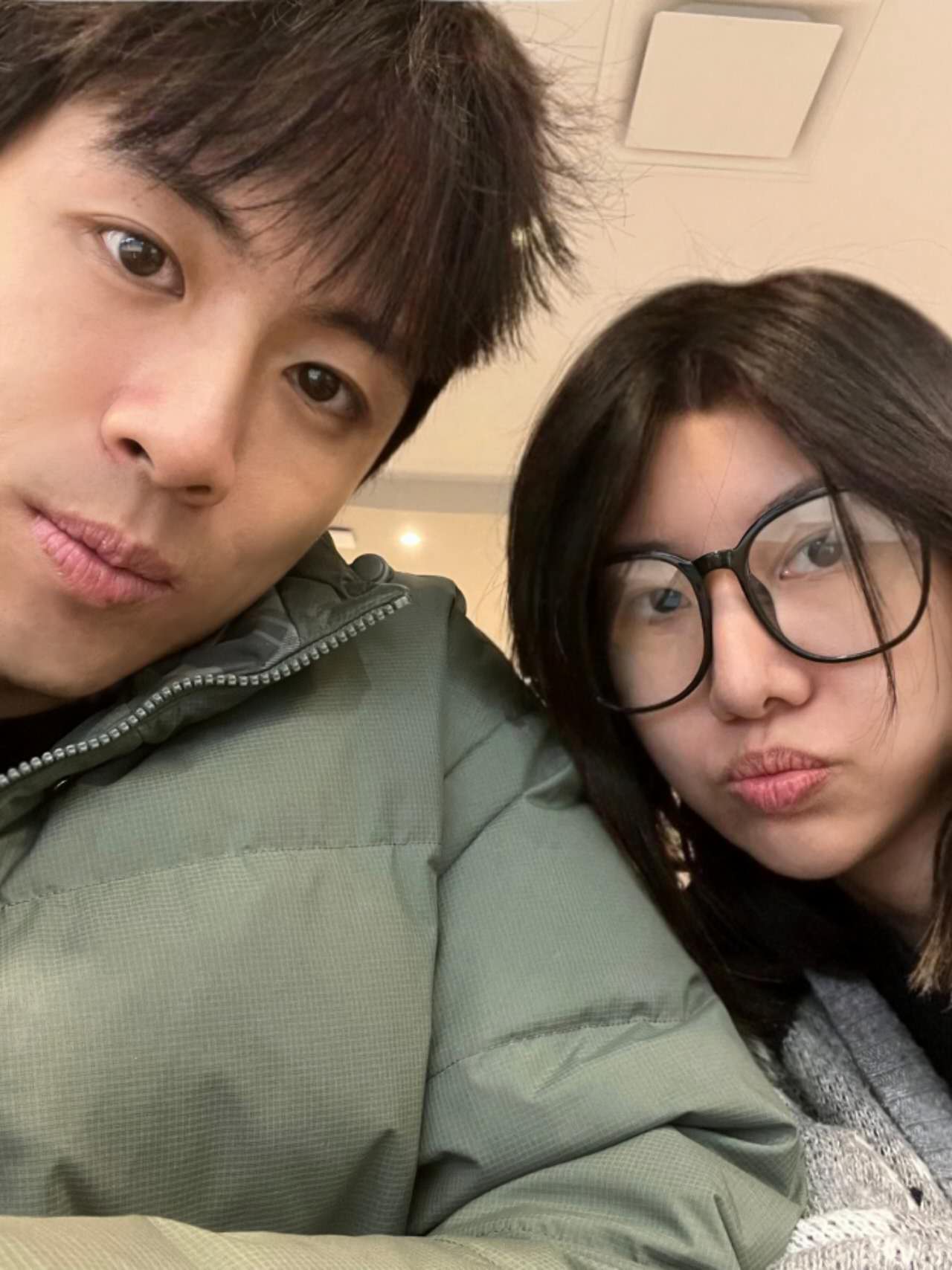 Couple making pouty faces